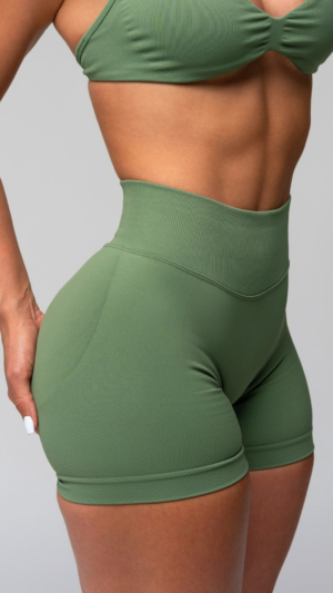 Olive MG shorts, side view, studio.